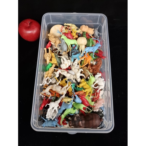 225 - A box filled with approximately one hundred vintage plastic animals including domestic and exotic an... 