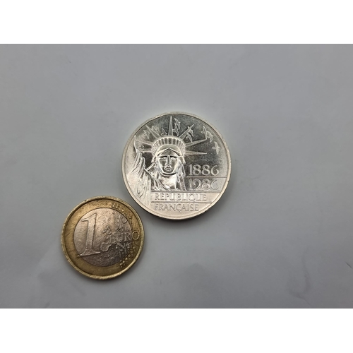31 - A French 100 franc Statue of Liberty non-circulating coin. Silver content .950, weight 15g. Comes wi... 