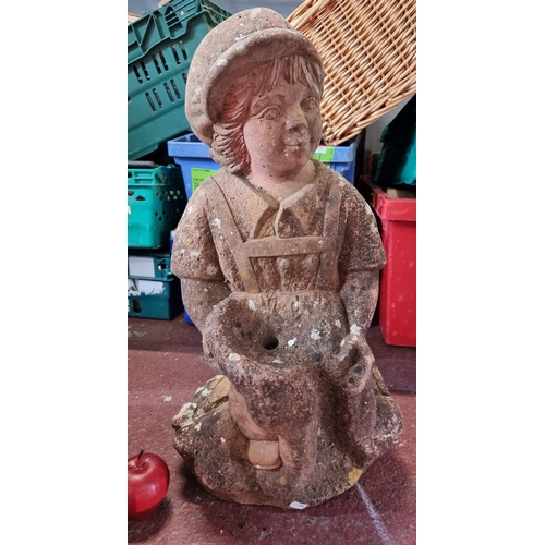 598 - A fabulous antique terracotta toned stone sculpture of a little boy holding a basket, this basket ha... 