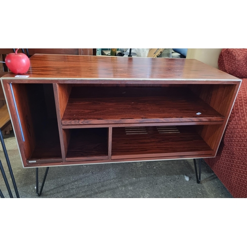 609 - Star Lot : A mid century Bang & Olufsen rosewood media music cabinet, By Jacob Jensen in a striking ... 