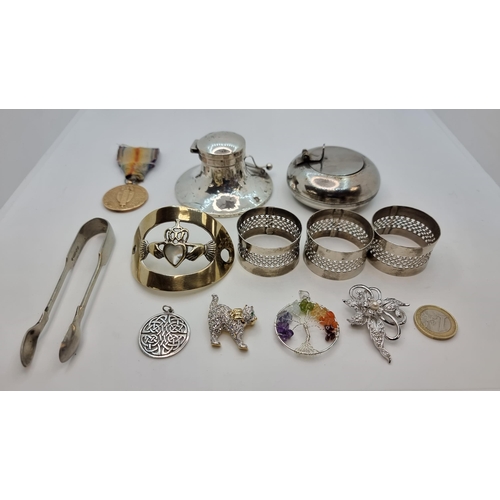 725 - 11 items including a gold plated Claddagh hair pin with mother of pearl inlay, an antique inkwell an... 