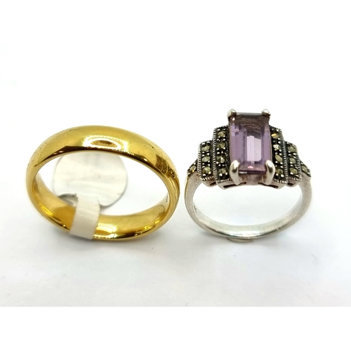 726 - Two stunning rings including an Art Deco  sterling silver example with amethyst and marcasite with a... 