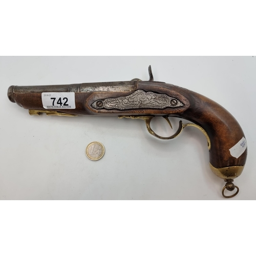 742 - Star Lot : An antique original  wooden handled flint lock pistol, with brass handled fittings. Lengt... 