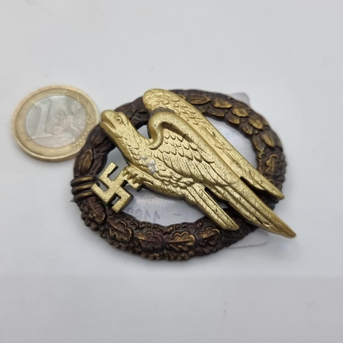 745 - An example of a German WWII paratrooper badge. Makers mark on back