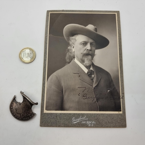 754 - Star Lot : A Wild Bill Cody (Buffalo Bill) hand signed photograph, together with a US dollar coin wi... 