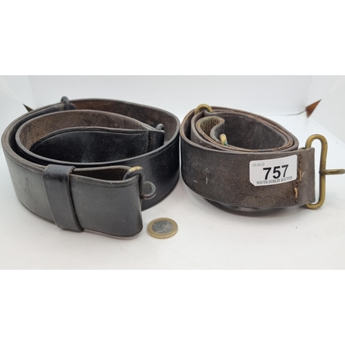 757 - Two antique leather belts, both from the Royal Irish Constabulary (1822-1922). Belts feature brass a... 