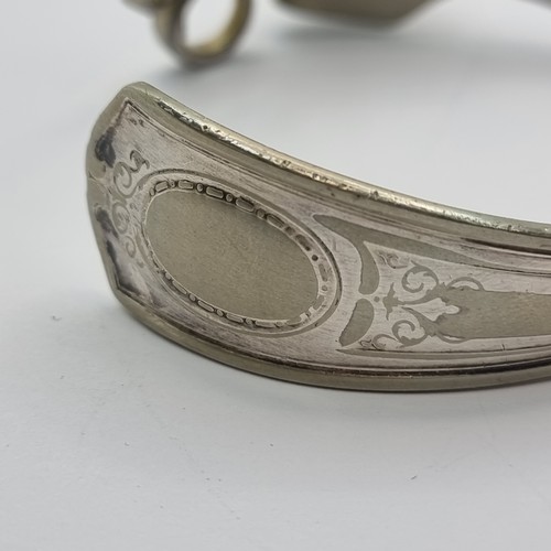 8 - A very nice example of a vintage Danish designer silver torc bracelet, circa 1960, with mounted poli... 