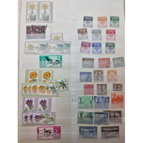 13 - A fully furnished stamp album, consisting of old world stamps, some mint, including USA and South Am... 
