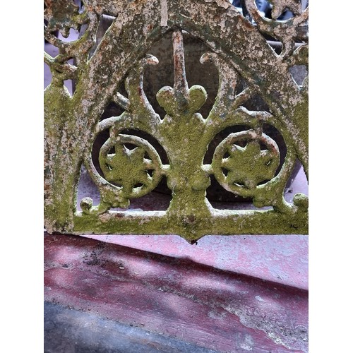 328 - Star Lot: A  magnificent example of a Victorian cast iron bench complete with bench back and bench e... 