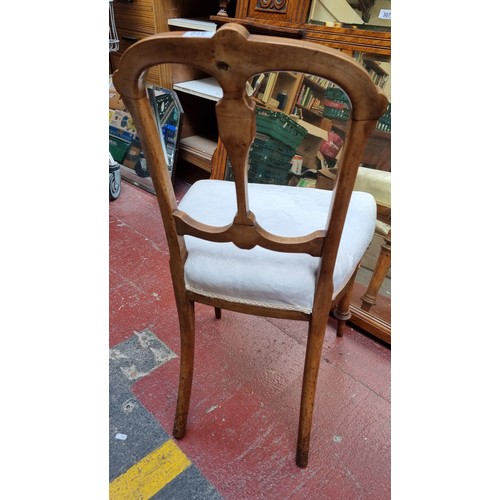 310 - Star Lot : A set of six Italian style maple dining chairs. With ebonised inlay and intricate foliate... 