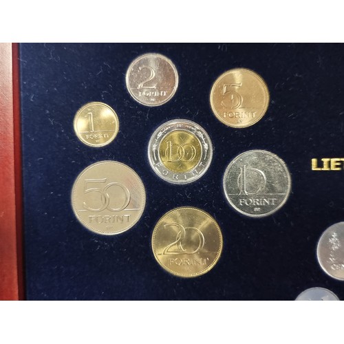 42 - A boxed collection of European coinage, issued by the Netherlands Mint Office, of 10 new entry count... 