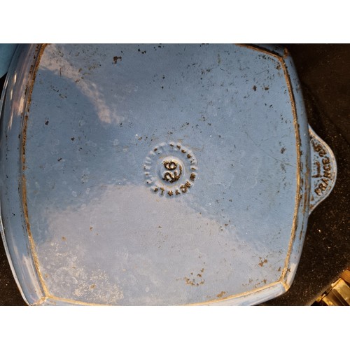 259 - A set of three cast iron blue enamelled pans, including a vintage French made Le Creuset griddle pan... 