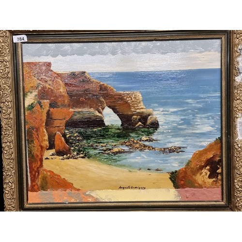 84 - A large original oil on board painting of a shoreline caves and rock formations at sunset with deep ... 