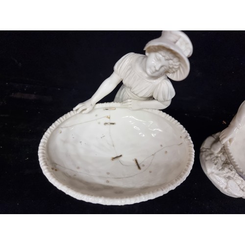 130 - Star Lot : A stunning pair of antique porcelain figural serving dishes c.1884, modelled by James Had... 