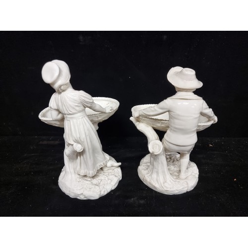 130 - Star Lot : A stunning pair of antique porcelain figural serving dishes c.1884, modelled by James Had... 