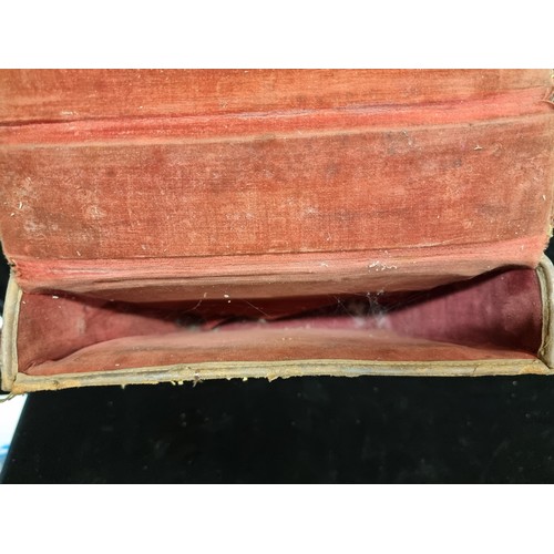 154 - A handsome 19 folio case, with beautifully aged tan leather, scarlet velvet interior and a sturdy le... 