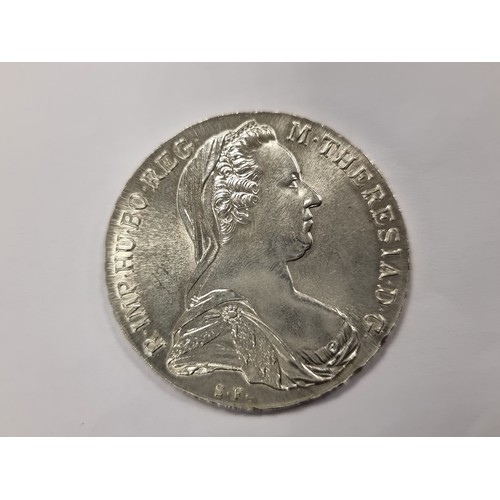 29 - An Austrian Habsburg Empress Maria Theresia standard circulation coin. Silver content .833, weight 2... 