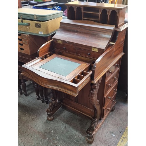 386 - Star Lot : A fabulous serpentine Davenport desk with a secret pop up top. The pull out fitted interi... 