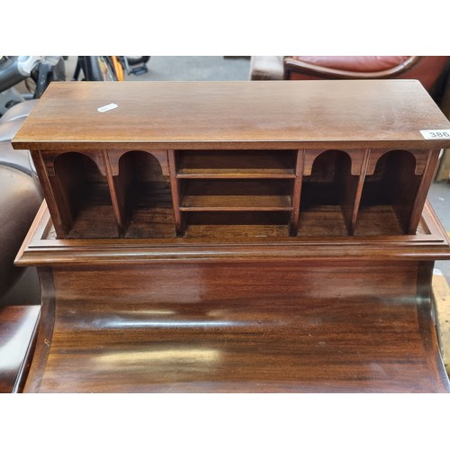 386 - Star Lot : A fabulous serpentine Davenport desk with a secret pop up top. The pull out fitted interi... 