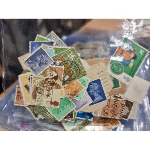 423 - An extremely large collection of assorted worldwide stamps.