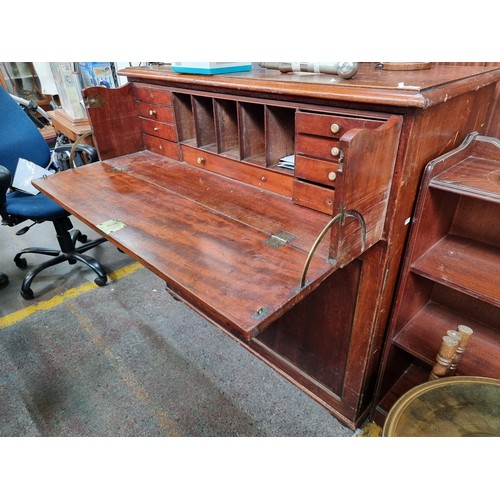 483 - A handsome late Victorian mahogany secretaire with a drop down writing slope and a number of interna... 