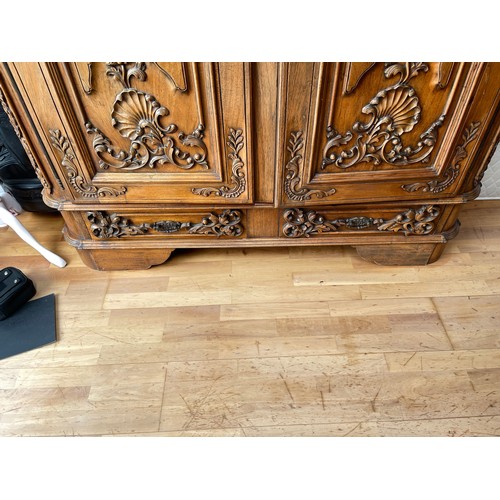 605 - Star Lot : A fantastic huge oak wardrobe with curved pediment top. Featuring lavish oak leaf and aco... 