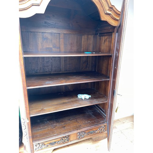 605 - Star Lot : A fantastic huge oak wardrobe with curved pediment top. Featuring lavish oak leaf and aco... 