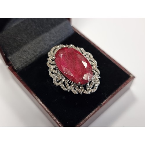 232 - Star Lot : A fabulous new huge Ruby and Diamond ring.  With a fabulous 24ct Ruby, 0.9cts of Diamonds... 