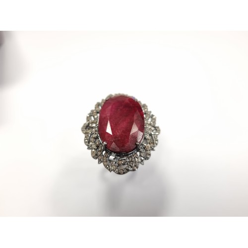 232 - Star Lot : A fabulous new huge Ruby and Diamond ring.  With a fabulous 24ct Ruby, 0.9cts of Diamonds... 