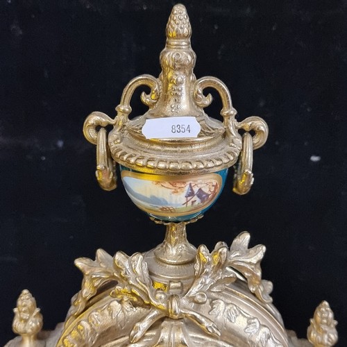 161 - Star Lot : A 19th century French style mantle clock by Franz Hermle, Germany. Striking on bells with... 