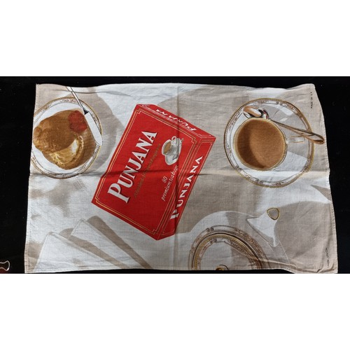 222 - A selection of six textile pieces including branded advertising items such as a Punjana brand tea-to... 