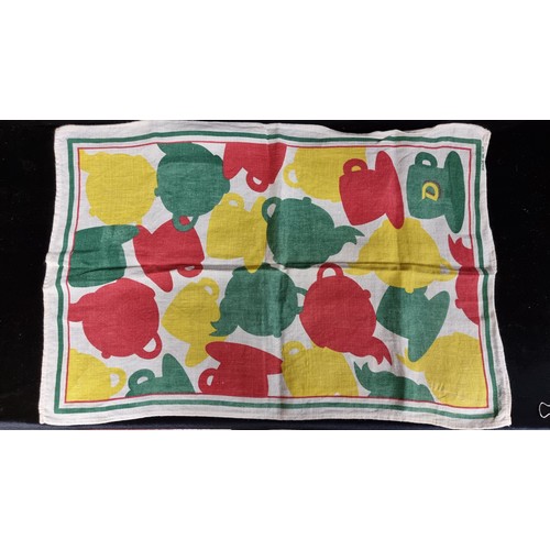 222 - A selection of six textile pieces including branded advertising items such as a Punjana brand tea-to... 