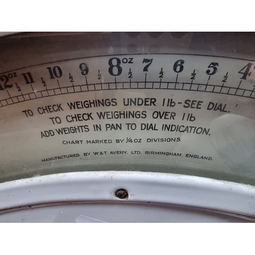 359 - A large vintage Avery ''White Knight'' grocer's weighing scales to weigh up to 20 lbs. With two matc... 