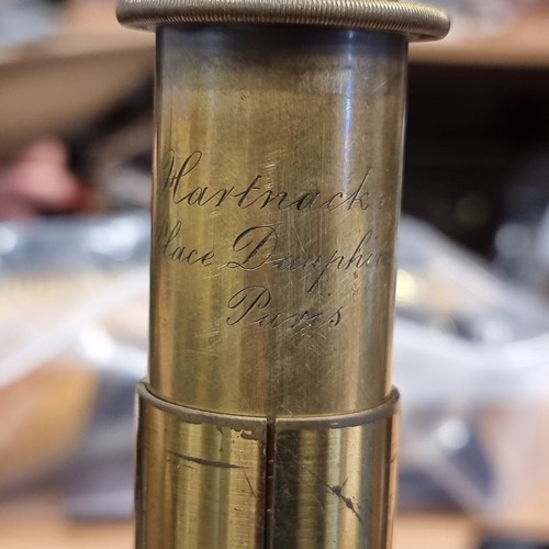 759 - A super 19th century brass microscope with heavy base. Height 33cm. According to inscription, Manufa... 