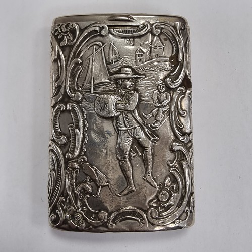 746 - A continental silver vesta case with striker to base. Featuring highly decorated detail. Silver cont... 