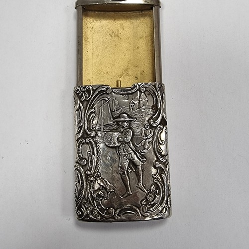 746 - A continental silver vesta case with striker to base. Featuring highly decorated detail. Silver cont... 