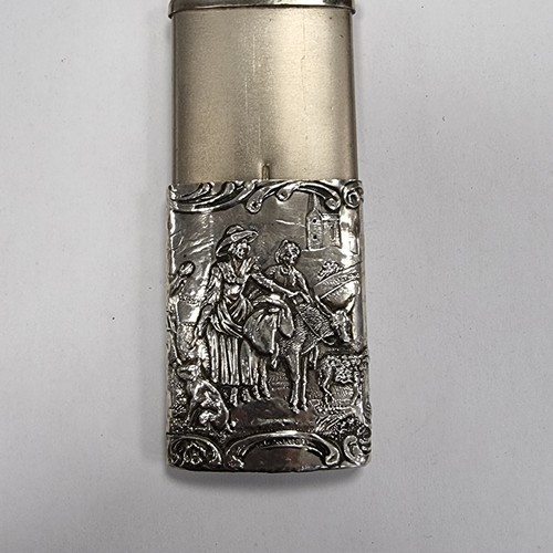 746 - A continental silver vesta case with striker to base. Featuring highly decorated detail. Silver cont... 