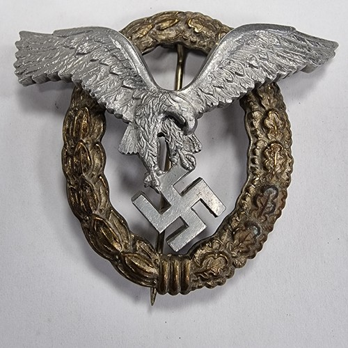 744 - An example of a German WWII Luftwaffe pilot's badge. makers mark on back.