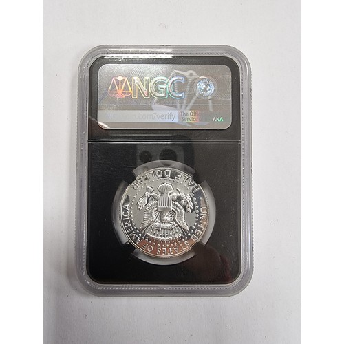 730 - A gem proof 1969 USA 50 cent silver coin that has been verified by the NGC bears the signature of As... 