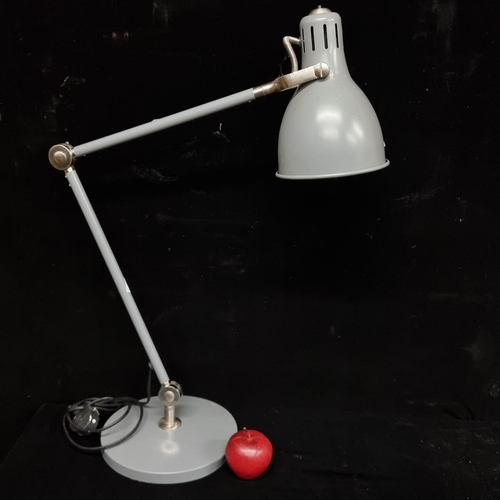 A large retro articulated table lamp with adjustable height, finished in grey.