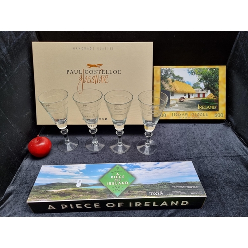 486 - Three items including a four piece glass set designed by Paul Costelloe for Newbridge and two sealed... 