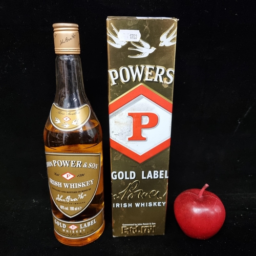 124 - A bottle of Powers Gold Label Irish Whiskey in original presentation box.