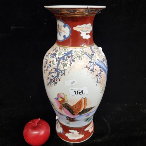 154 - An antique large Chinese porcelain vase beautifully glazed with motifs of cherry blossoms, magnolia ... 