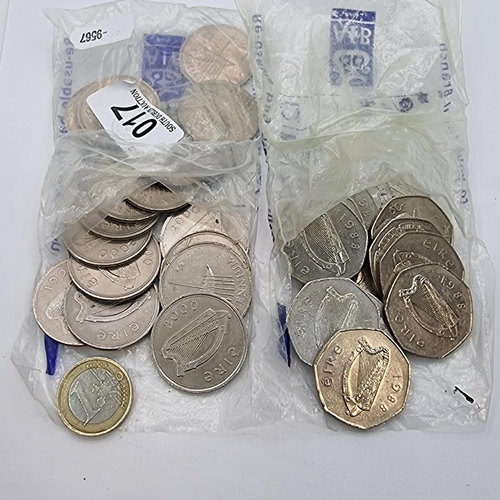 17 - An assorted collection of coins, including Irish 50 pence and one pounds. Total weight: 396 grams.