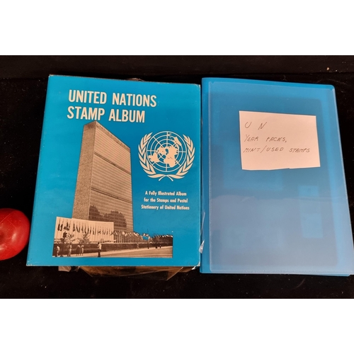 195 - Two stamp albums containing a wonderful collection of mint condition and used United Nations stamps ... 