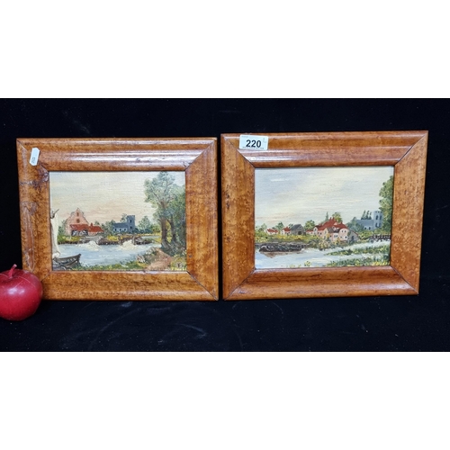 220 - A pair of early 20th century original oil-on-board paintings of a riverside Continental scenes, with... 