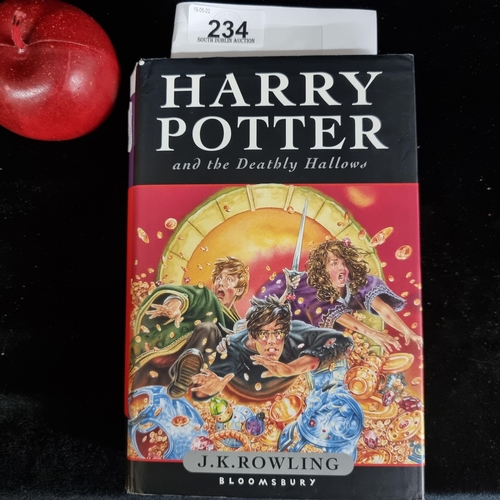 234 - A hardback first edition copy of the book: ''Harry Potter and the Deathly Hallows''. Published by Bl... 