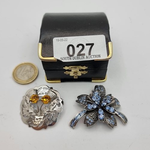 27 - Two stunning brooches, the first is a sterling silver example with Scottish design and Citrine gemst... 