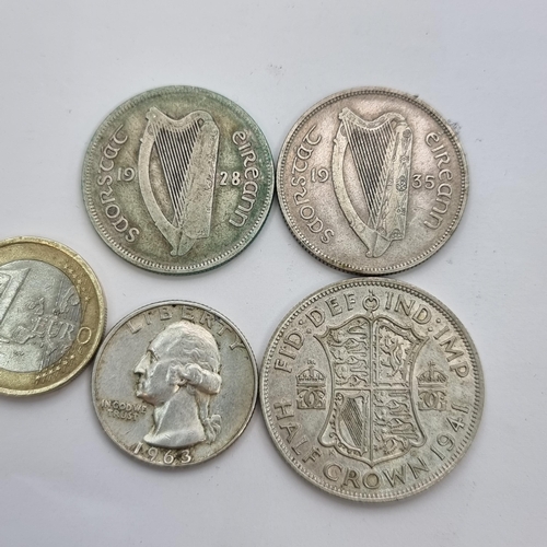 29 - A collection of coins, consisting of a Uk  silver 1941 half crown, two shilling florin coins, with a... 