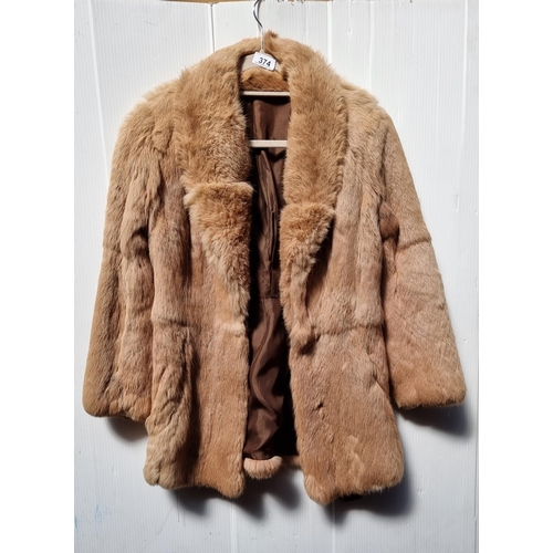 374 - A genuine vintage ladies jacket in coney fur. Made in Ireland by Julien Vard. Size 10.